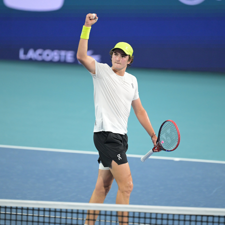 Fonseca battles illness to prevail in Miami opener