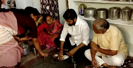 Telangana CM eats lunch with beneficiary family of fine rice scheme