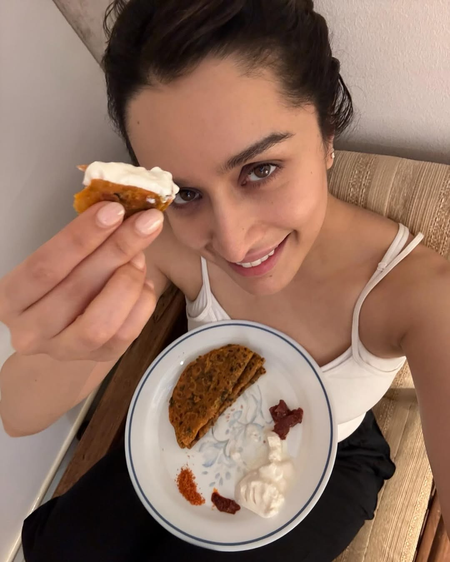 Shraddha Kapoor is all smiles as she savours some yummy theple
