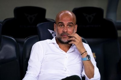 <div>Guardiola is ‘absolutely’ confident of Man City securing UCL qualification</div>