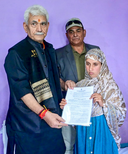 <div>J&K L-G meets family of Pahalgam terror attack, gives govt job letter to victim’s wife</div>