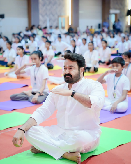 Mohanlal felicitates two iconic Yoga teachers on International Yoga Day