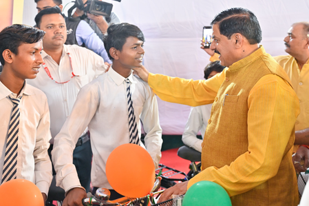 MP CM promises electric scooties, full medical education expenses for meritorious students