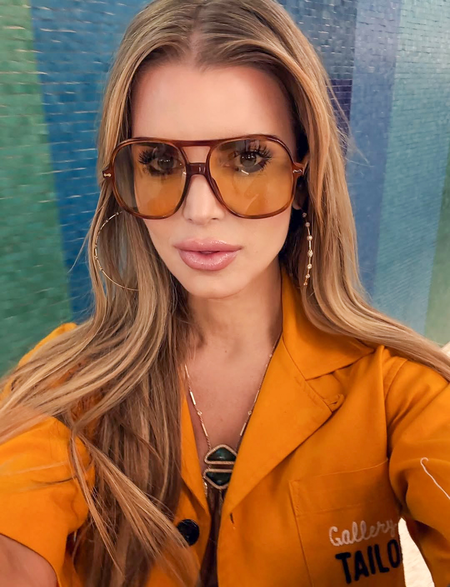 Jessica Simpson says tough times are behind her