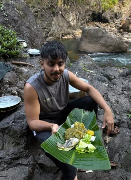 Adarsh Gourav enjoys yummy food on a banana leaf by the river side