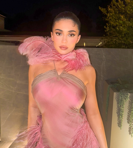 Kylie Jenner sets mercury soaring as she sizzles in gold metallic bikini