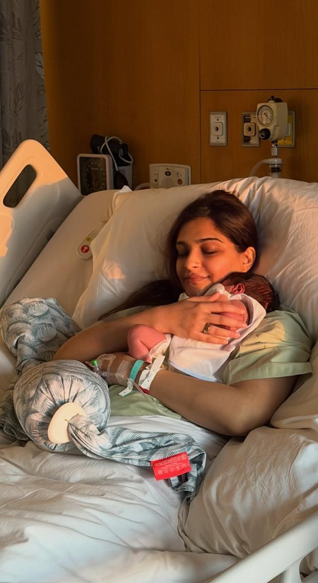 Sonam Kapoor shares first pic holding her newborn close to her heart from the hospital