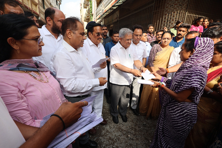 Union Minister CR Paatil distributes flood relief assistance to affected families in Surat