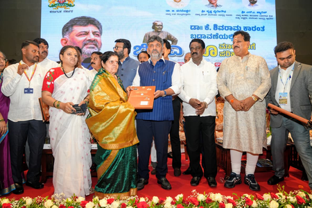 ‘I am also a farmer’s son; I understand your pain’: K’taka CM Shivakumar gives compensation to Shivaram Karanth Layout landowners