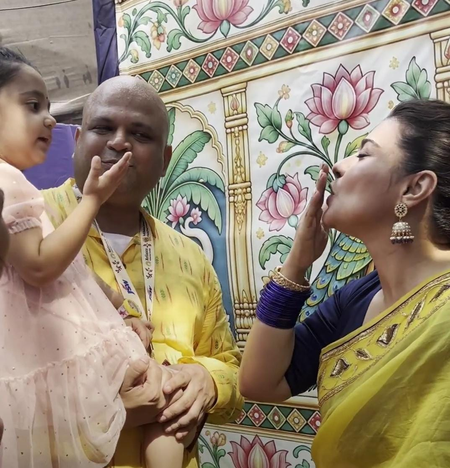 Kajol mingles with little girl, serves bhog to devotees at Durga Puja pandal, calls it ‘Family, Bhakti and Bhog’